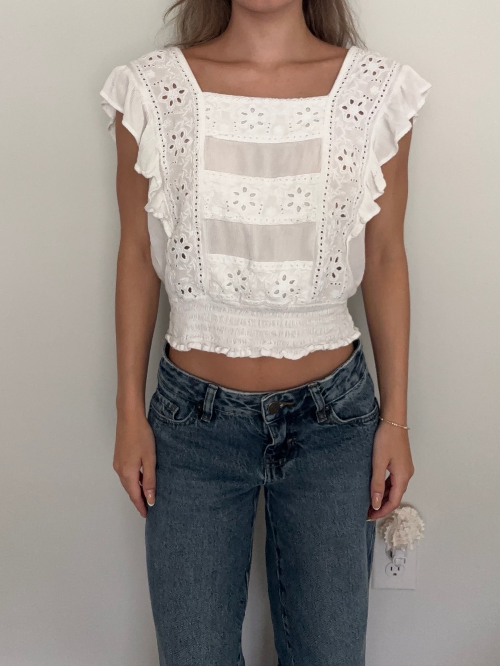 American Eagle white eyelet crop top with ruffles and floral embroidery, size XS